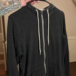 Woman’s Large Danskin Black and White textured Zip-Up Hooded Sweater